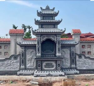 Lăng đá granite Bình Định dạng cánh tam quan, 2 tầng mái, chạm hạc trầu và sen